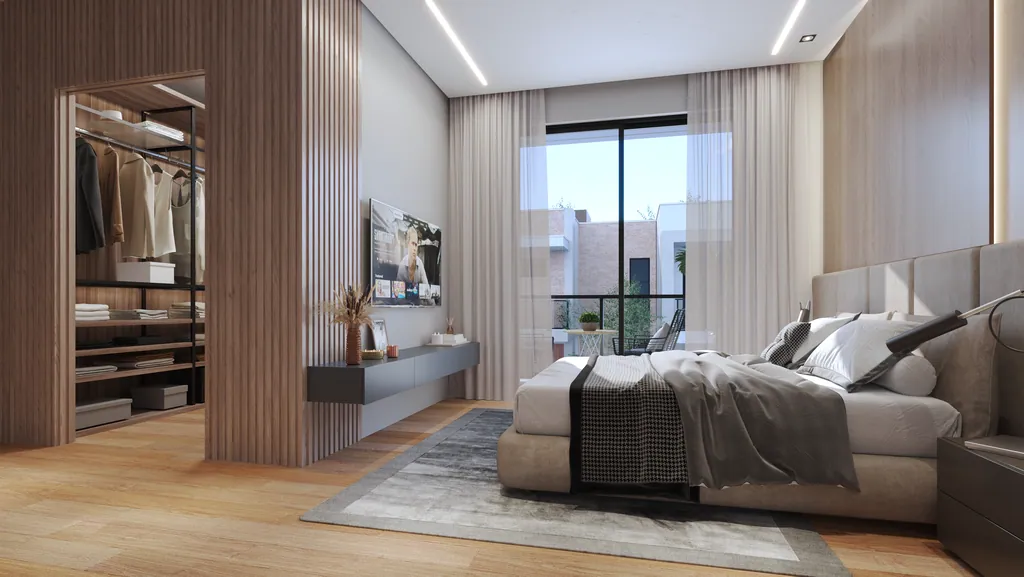 Closet aberto integrado à suíte master, com divisória ripada em madeira